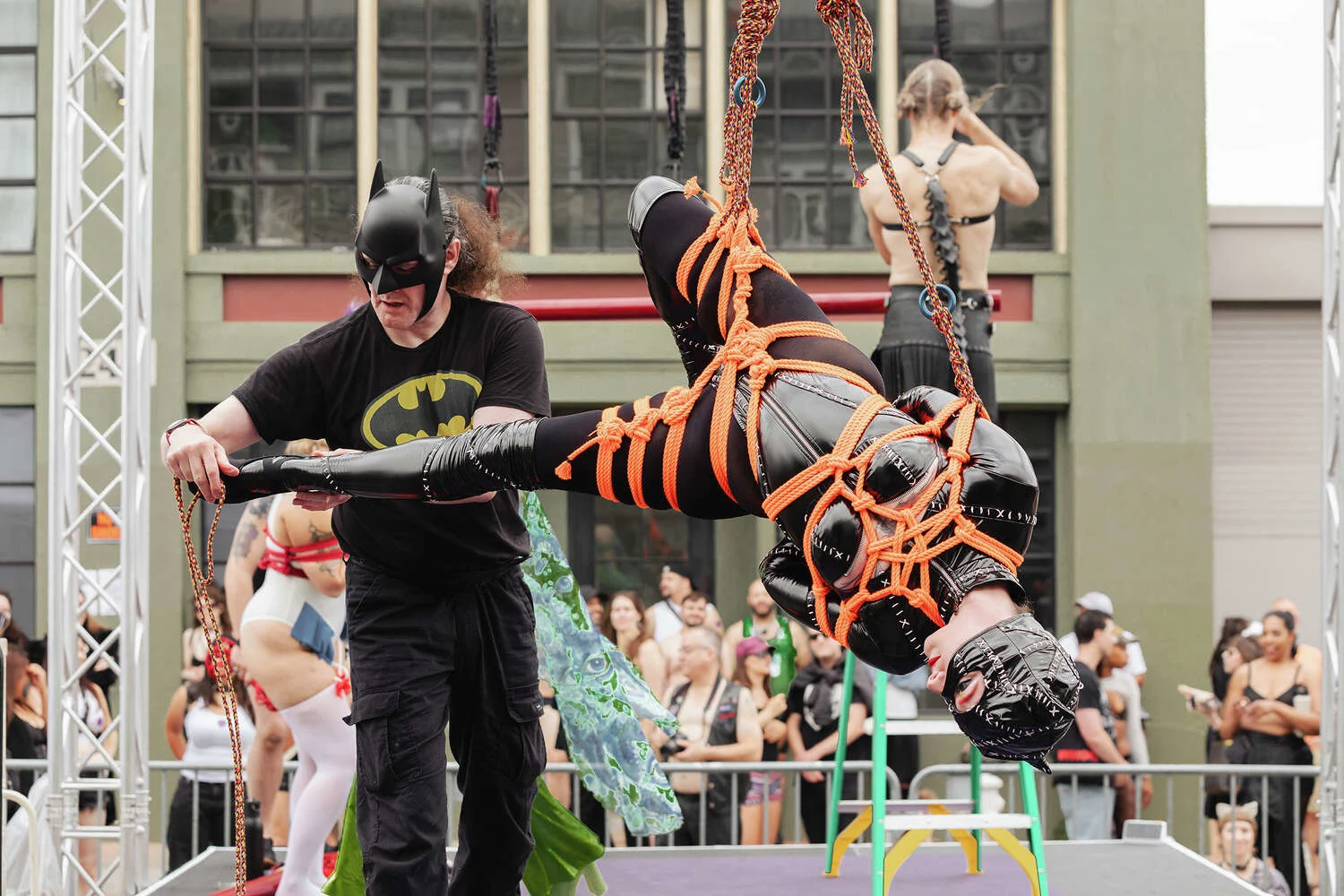 A scene from the the Twisted Windows stage at the Folsom Street Fair on Sunday afternoon, Sept. 28, 2025. (Kevin Kelleher & Emily Trinh/For SFGATE)