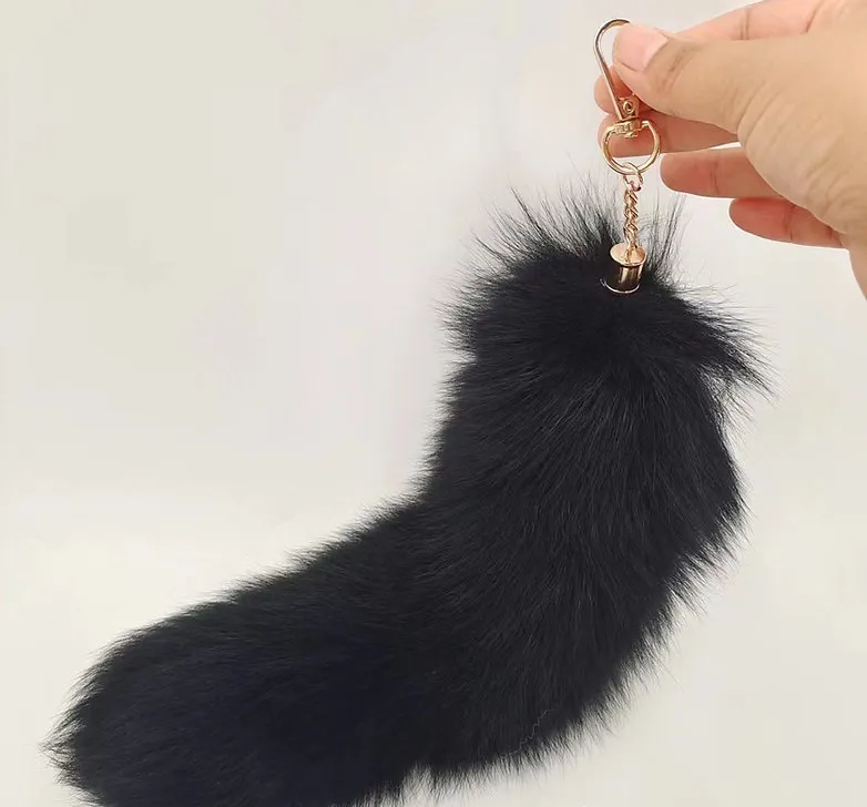 Đuôi cáo xù đen gài phụ kiện trang trí